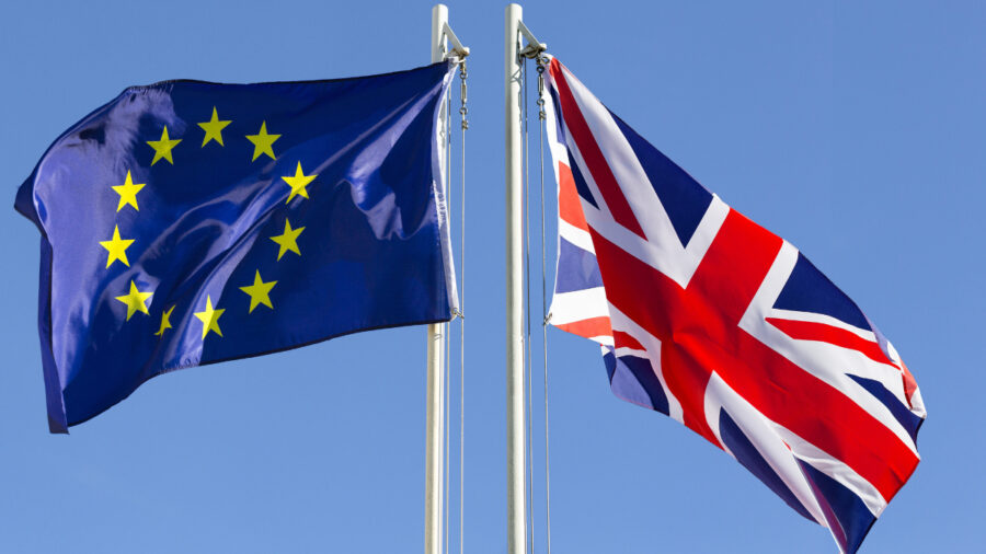 European Union Flag And Flag Of Uk On Flagpole